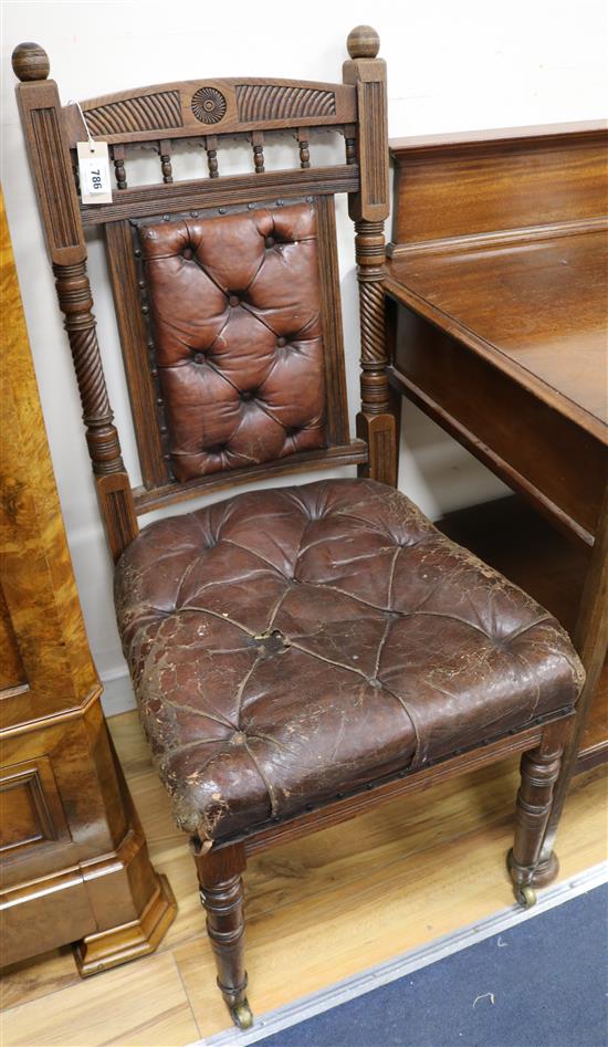 Six leather button back dining chairs